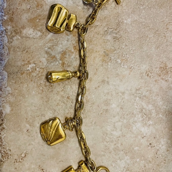 Vintage 1980's ESTEE LAUDER Gold Tone Toggle Charm Bracelet - Picture 2 of 4